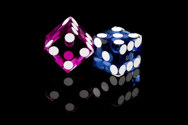 Mobile phone showing Liga 1 match odds and live blackjack table on flyff app